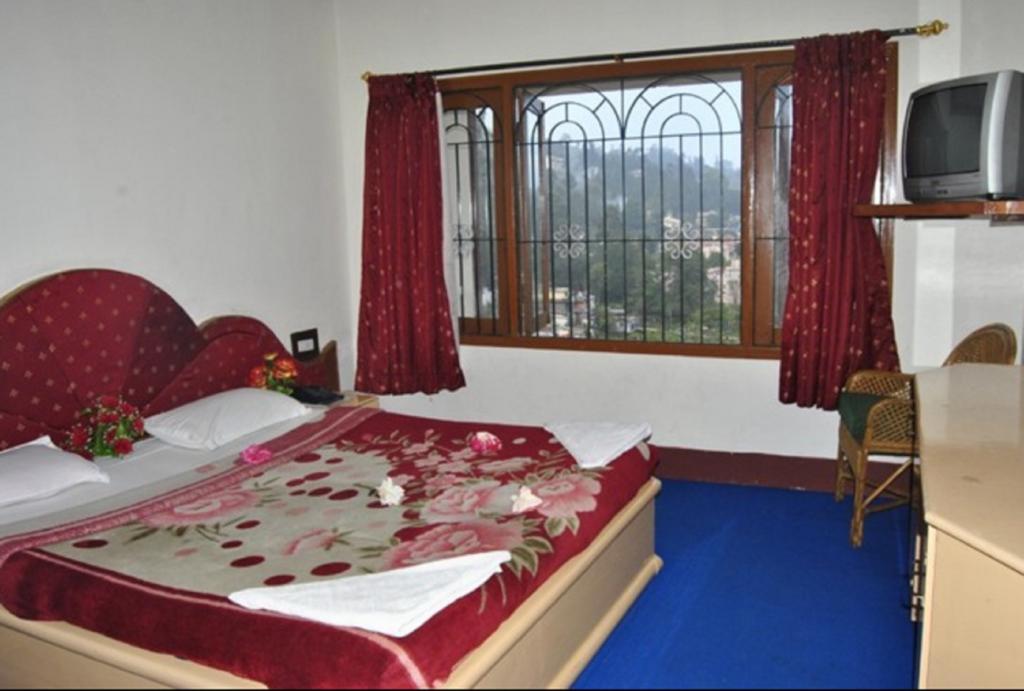 Hotel Ruby International Kodaikanal Kamer foto